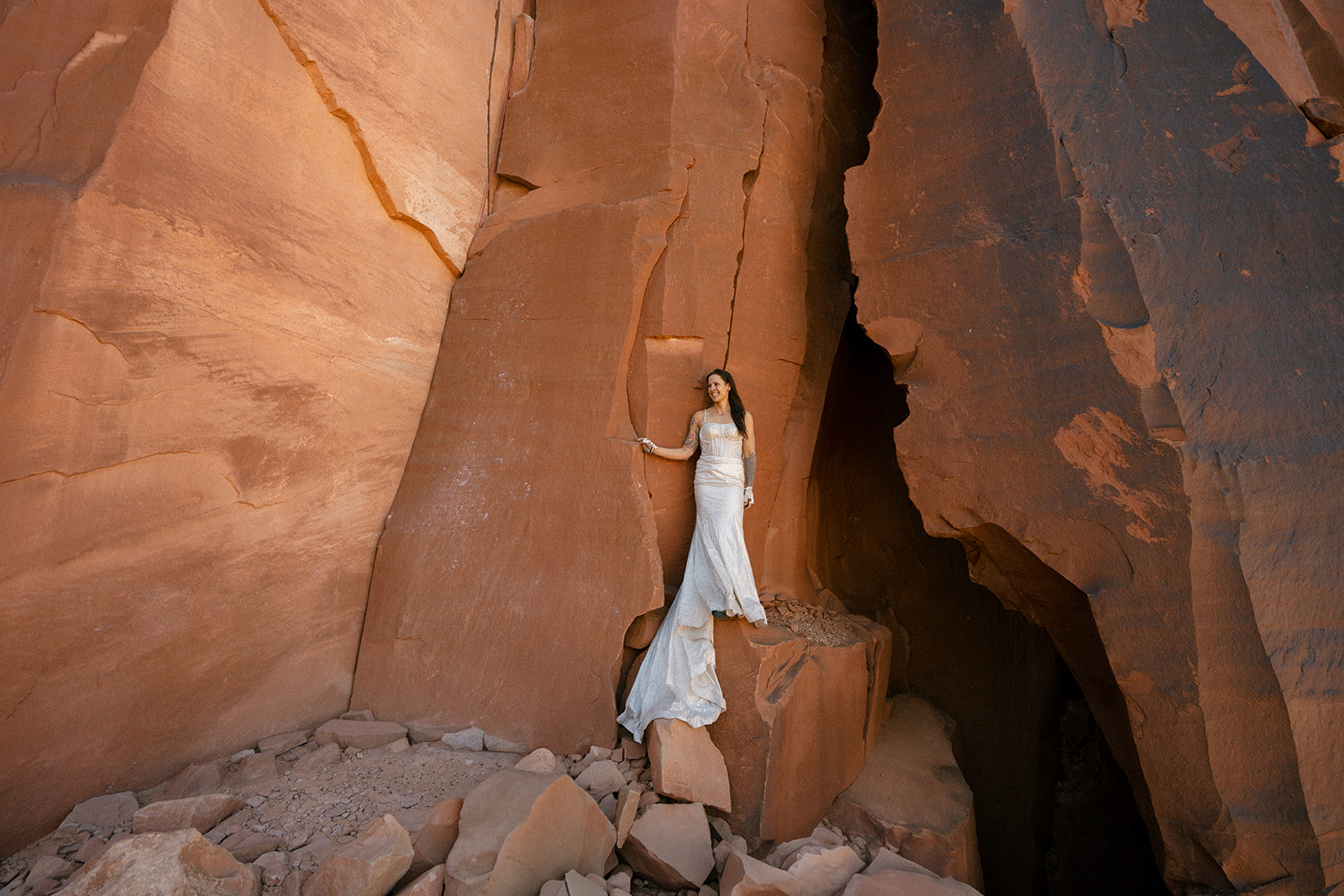 Woman Climbing in utah in a wedding dress