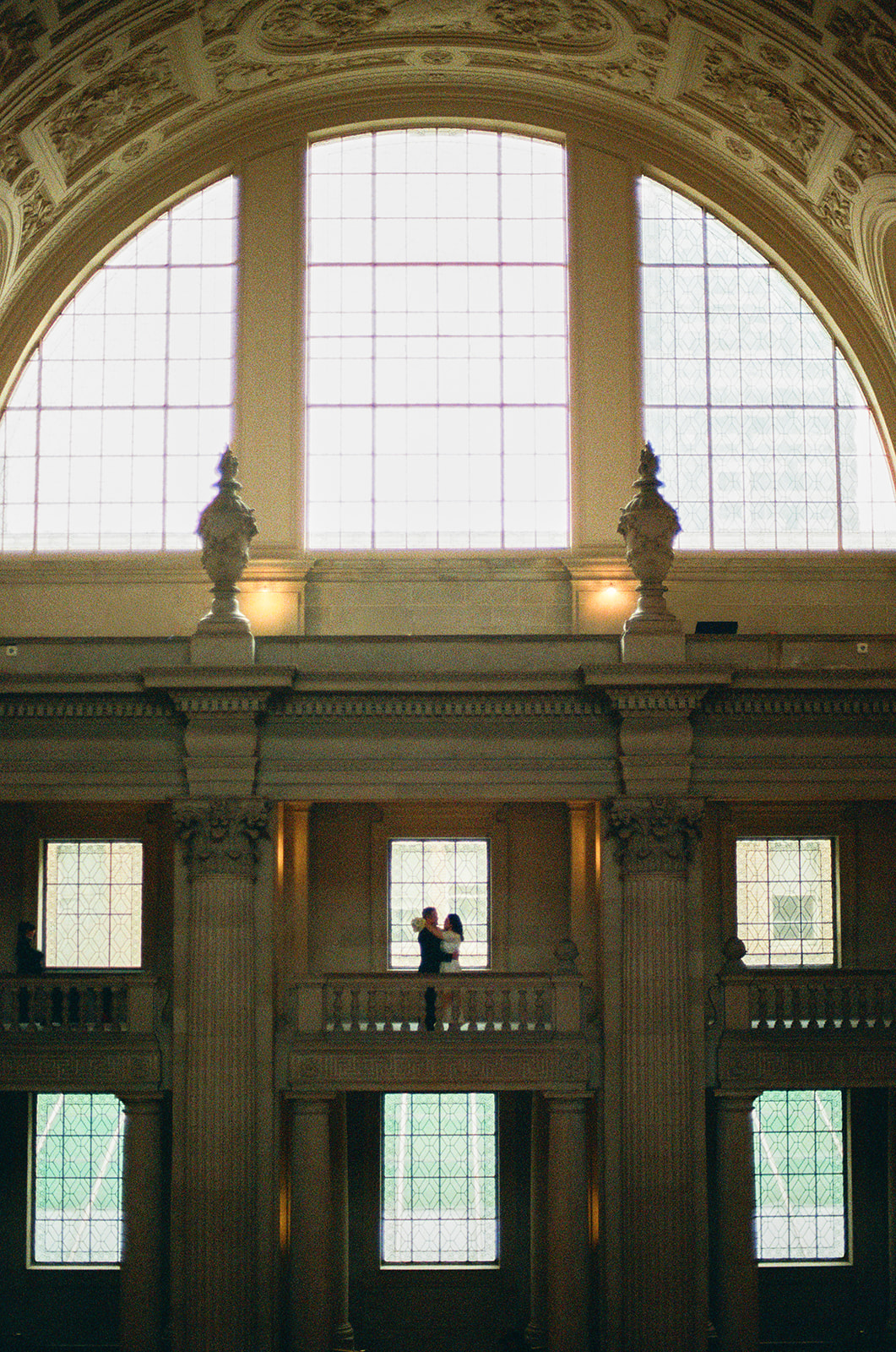 silhouetted image of couple at an SF City Hall engagement